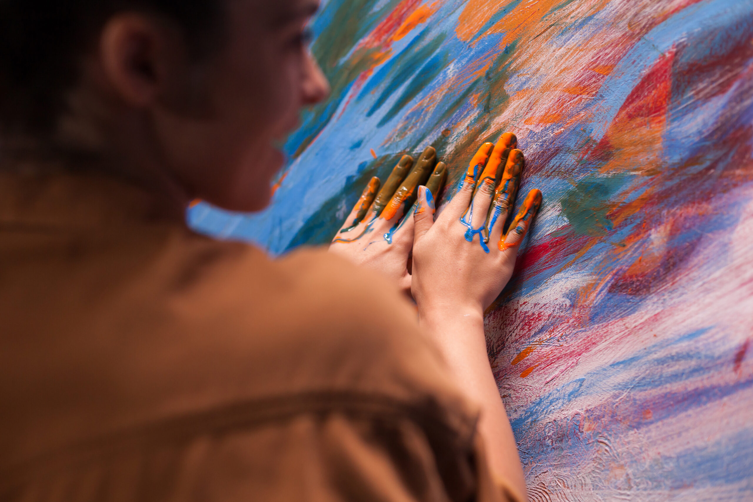 Hands of artist with paint on canvas in art studio. Modern artwork paint on canvas, creative, contemporary and successful fine art artist drawing masterpiece. Art Therapy for Grief: A Healing Path Through Creativity